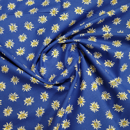 tissu-edelweiss-coton-fond-bleu-broderie-passion