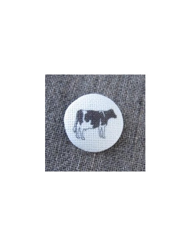 Bouton vache sur écru